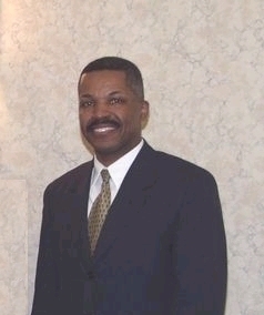 [Photo of Lloyd M. Terrell]